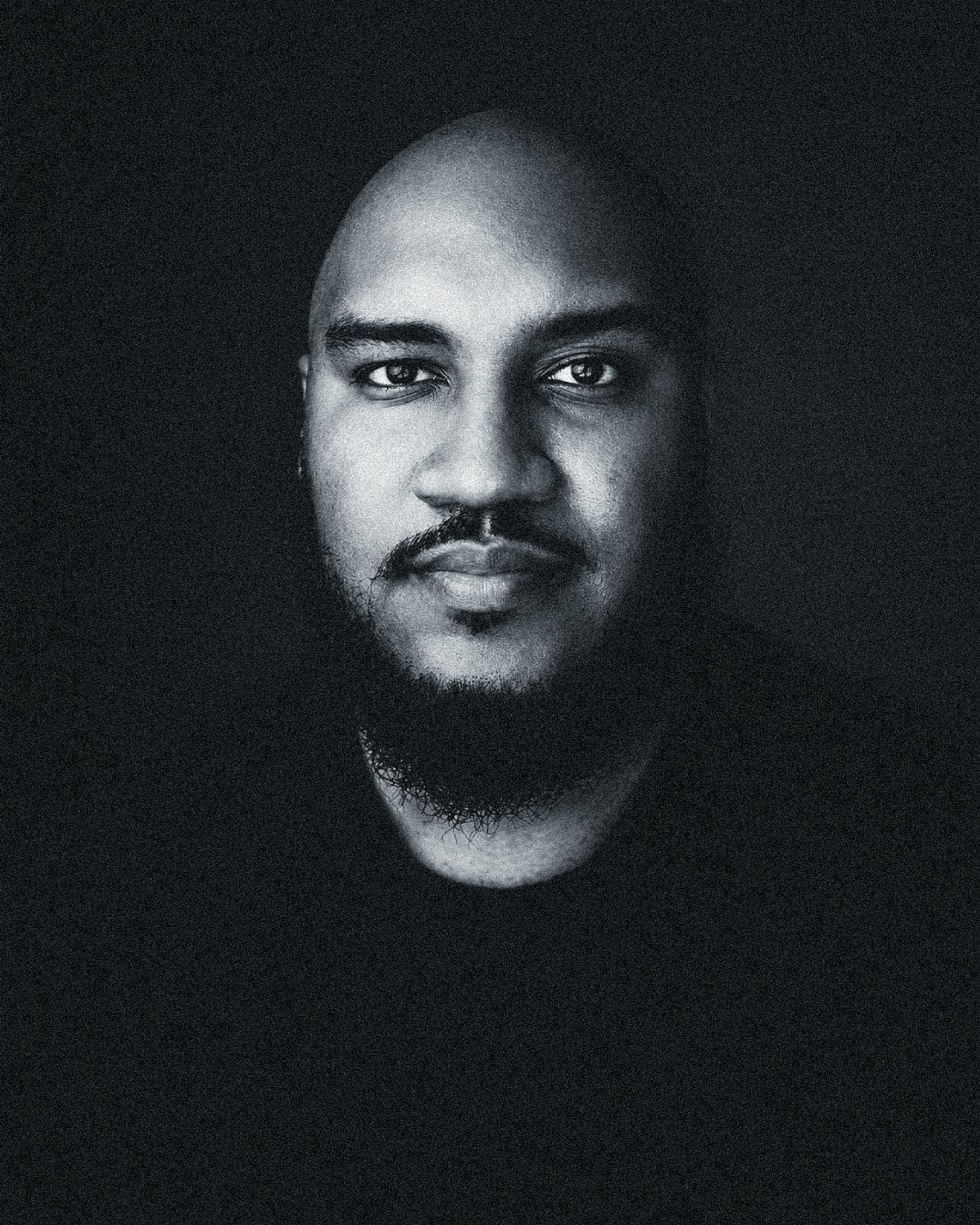 Black-and-white portrait of J.L. Woodson